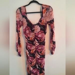 Long sleeved floral dress draped